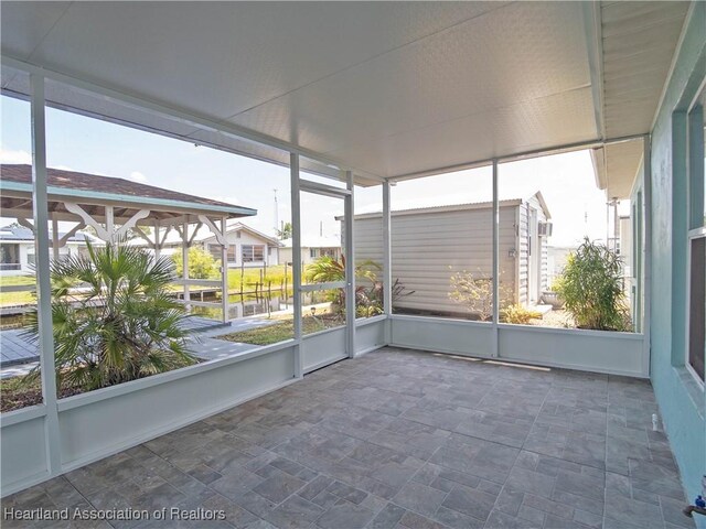 956 Shamrock Dr, Sebring, FL 33875 - view of unfurnished sunroom