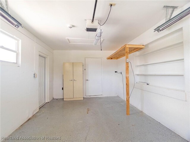 956 Shamrock Dr, Sebring, FL 33875 - garage with a garage door opener