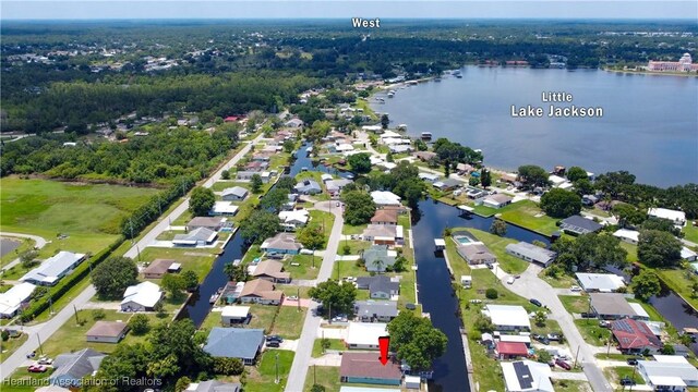 956 Shamrock Dr, Sebring, FL 33875 - aerial overview of property's location featuring nearby suburban area and a large body of water