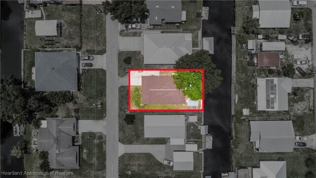 956 Shamrock Dr, Sebring, FL 33875 - aerial view of residential area featuring property boundaries highlighted