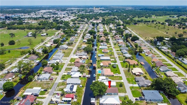956 Shamrock Dr, Sebring, FL 33875 - aerial view of property and surrounding area featuring nearby suburban area and a large body of water