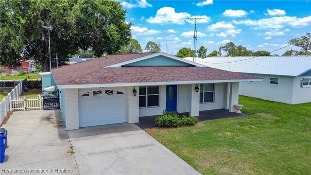 956 Shamrock Dr, Sebring, FL 33875 - ranch-style home with a garage, concrete driveway, a shingled roof, and brick siding