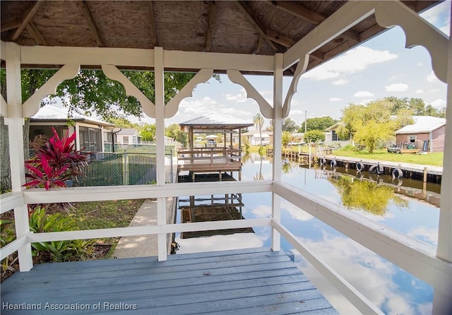 956 Shamrock Dr, Sebring, FL 33875 - dock area featuring a gazebo and a water view