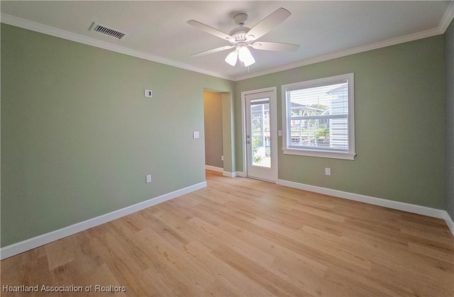 956 Shamrock Dr, Sebring, FL 33875 - unfurnished room featuring crown molding, light wood-style floors, baseboards, and ceiling fan