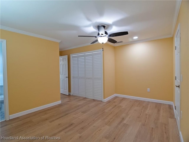 956 Shamrock Dr, Sebring, FL 33875 - spare room with a ceiling fan, light wood finished floors, baseboards, ornamental molding, and recessed lighting