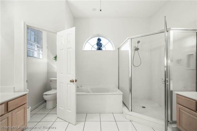 full bathroom with separate shower and tub, vanity, and toilet