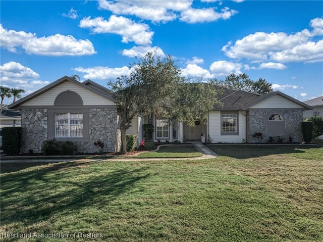 view of front of property with a front lawn