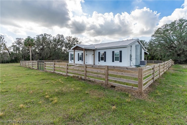 view of front of home with central AC unit