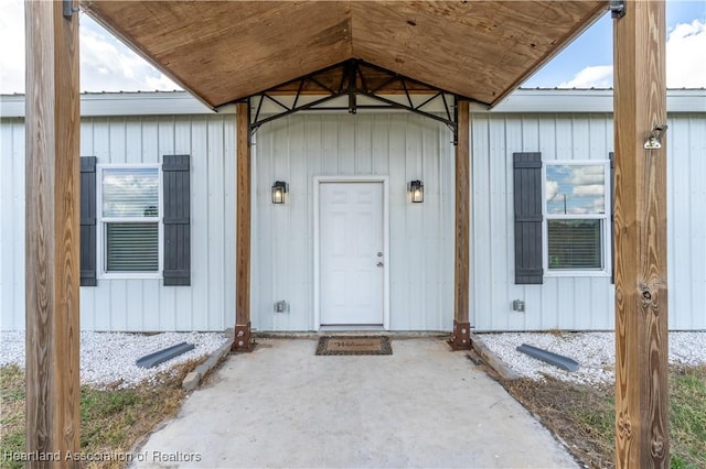 property entrance featuring a patio area