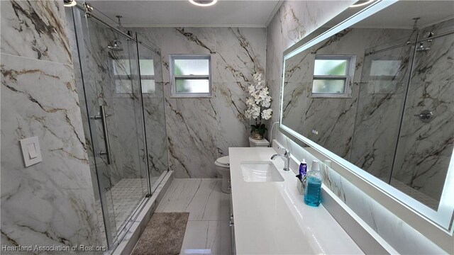 1022 Marble Ave, Avon Park, FL 33825 - bathroom featuring vanity, ornamental molding, a marble finish shower, and toilet