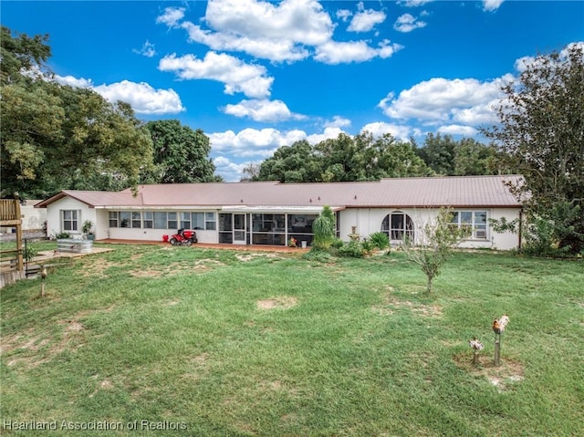 1022 Marble Ave, Avon Park, FL 33825 - view of front facade with a front lawn and a sunroom