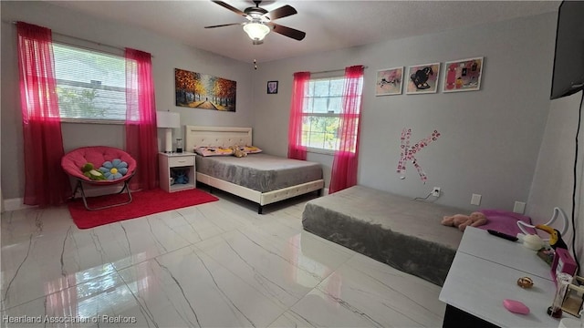1022 Marble Ave, Avon Park, FL 33825 - bedroom featuring marble finish floor and a ceiling fan