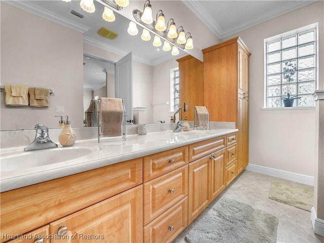 bathroom with ornamental molding, tile patterned flooring, and vanity