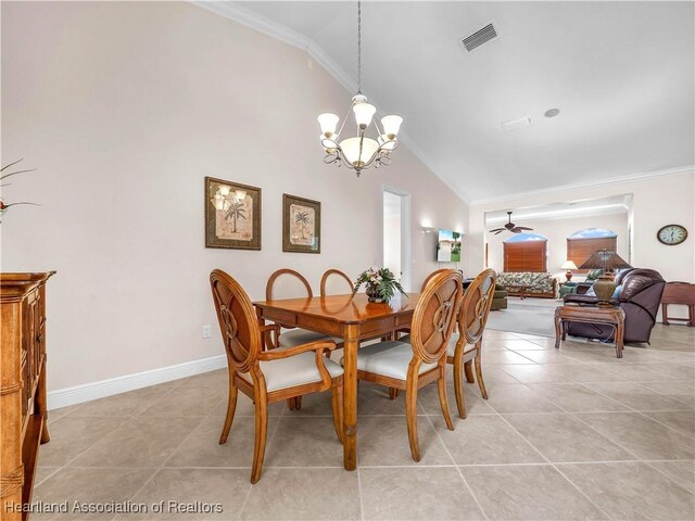 dining room with crown molding, ceiling fan, and light tile patterned flooring