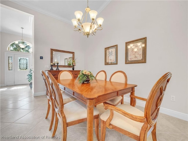 tiled dining room featuring a notable chandelier and crown molding