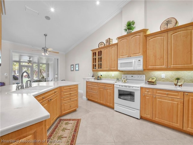 kitchen with sink, crown molding, white appliances, light tile patterned flooring, and decorative backsplash