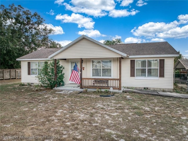 single story home featuring a porch