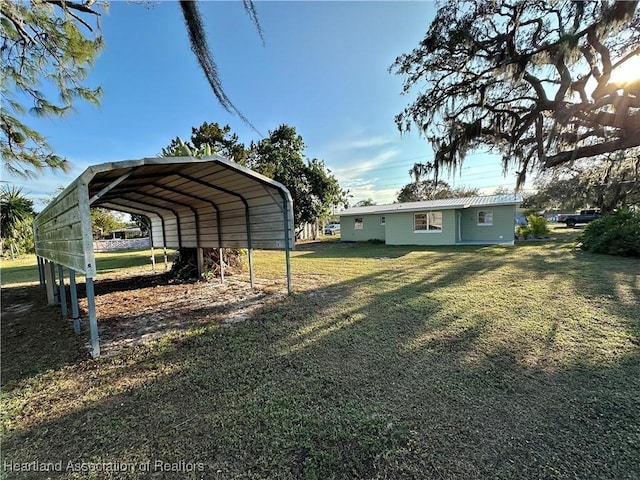 view of yard with a carport