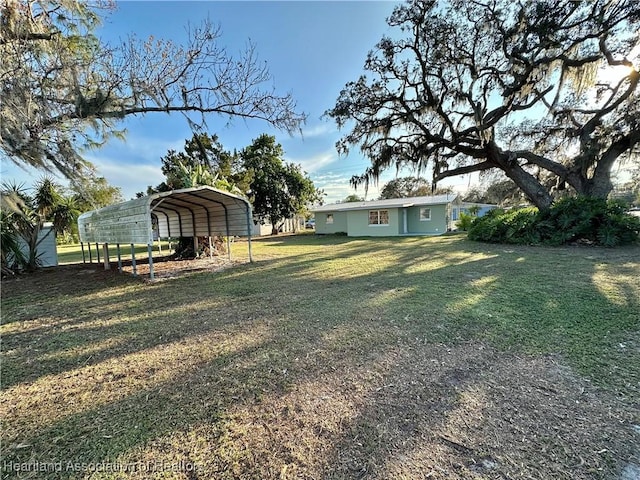 view of yard featuring a carport