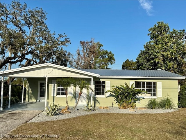 view of front of home featuring a carport