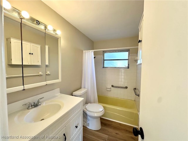 full bathroom with toilet, vanity, shower / bath combination with curtain, and hardwood / wood-style floors