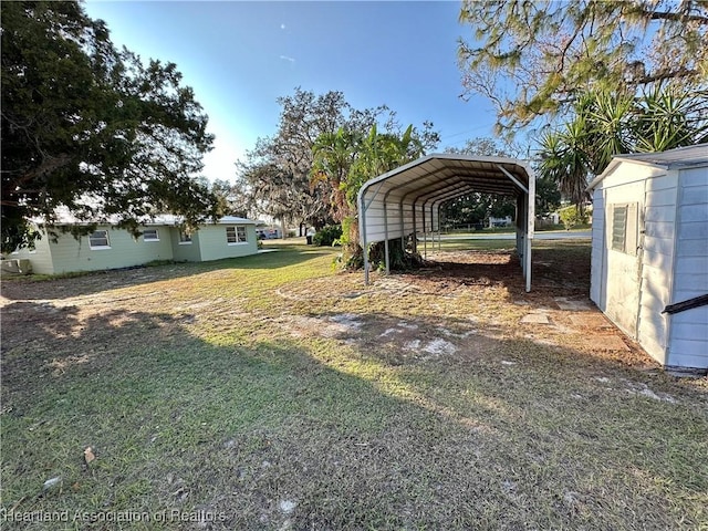 view of yard with a carport