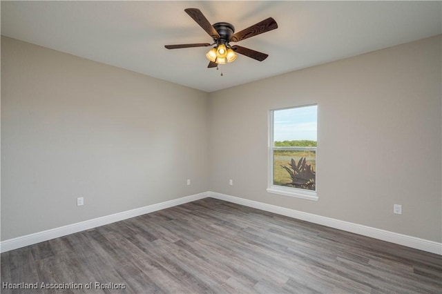 unfurnished room with wood-type flooring and ceiling fan