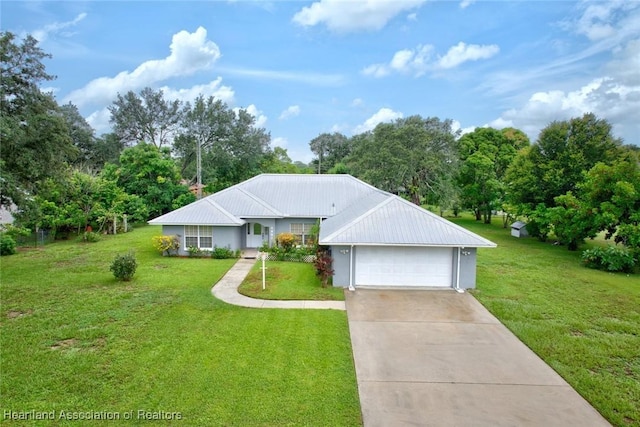 ranch-style house with a garage and a front lawn