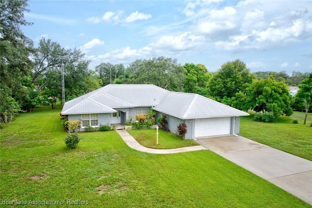 ranch-style home with a front yard and a garage