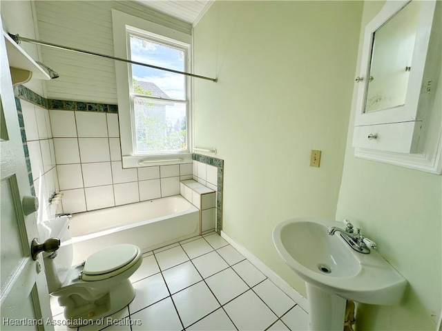 bathroom featuring tile patterned floors, sink, and toilet