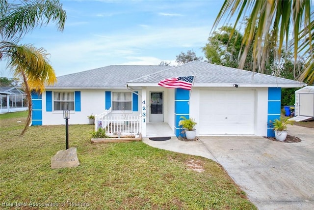 single story home featuring a front lawn and a garage