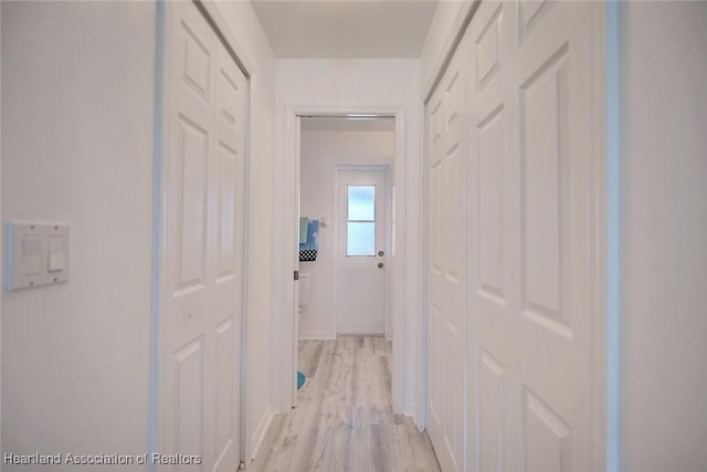 hall featuring light wood-type flooring