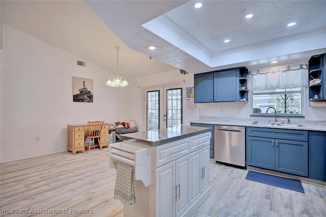 kitchen featuring dishwasher, a center island, sink, white cabinets, and french doors