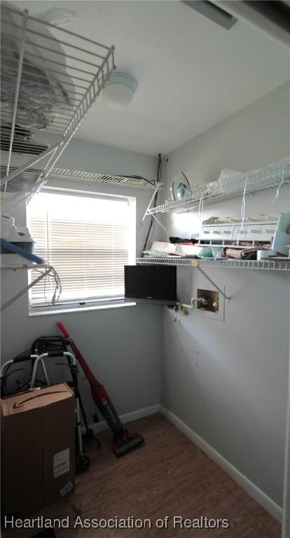1820 W Batavia Rd, Avon Park, FL 33825 - spacious closet featuring wood finished floors