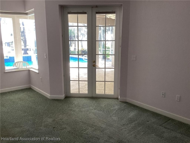 doorway to outside featuring carpet flooring, a wealth of natural light, and french doors