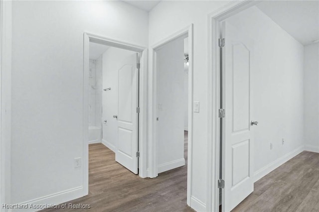 hallway featuring light hardwood / wood-style floors