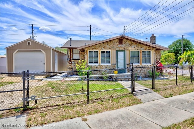 view of front of house with an outbuilding and a garage