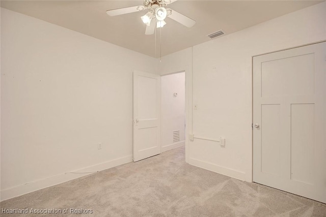 interior space featuring ceiling fan