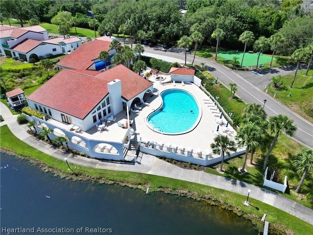 birds eye view of property featuring a water view