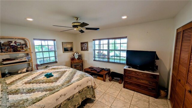 bedroom with a closet and ceiling fan