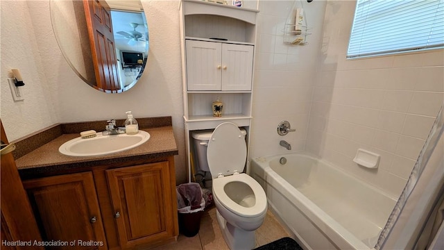 full bathroom featuring tile patterned flooring, vanity, shower / bath combination, and toilet