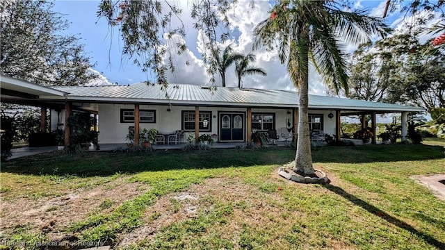 view of front of home with a front yard