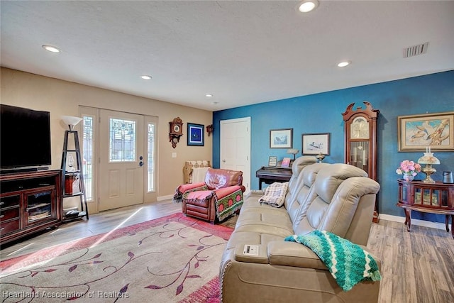 living room featuring light wood-type flooring