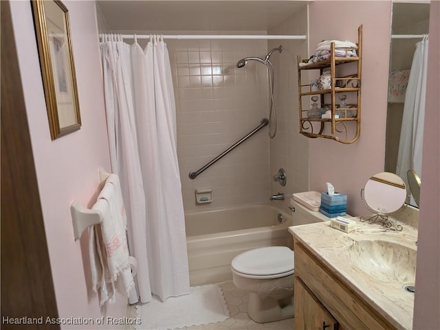 full bathroom with tile patterned floors, vanity, shower / bath combo, and toilet