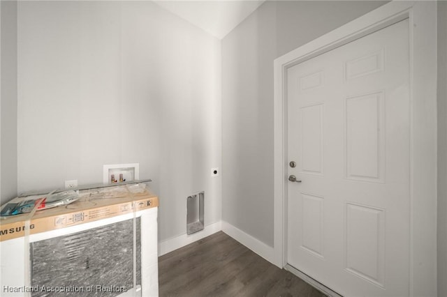 washroom featuring dark wood-type flooring, hookup for a washing machine, and electric dryer hookup