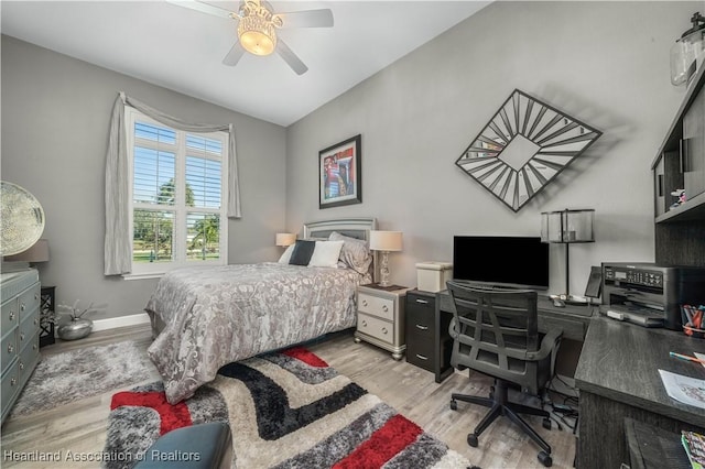 bedroom featuring light hardwood / wood-style flooring and ceiling fan