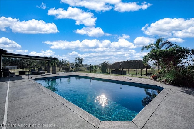 view of pool featuring a patio area