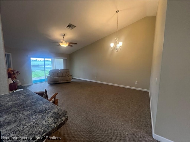 carpeted bedroom with access to outside, ceiling fan with notable chandelier, and vaulted ceiling