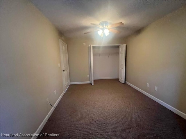 unfurnished bedroom with carpet flooring, a closet, and ceiling fan