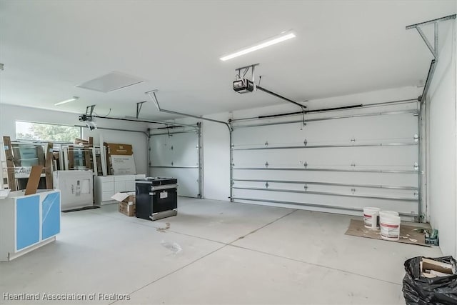 garage featuring a garage door opener